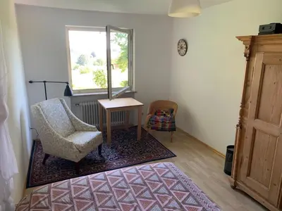 Ein Sitzbereich in der Unterkunft Zimmer mit Bergblick