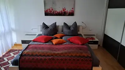 Ein Bett oder Betten in einem Zimmer der Unterkunft Ferienwohnung im Gartenparadies