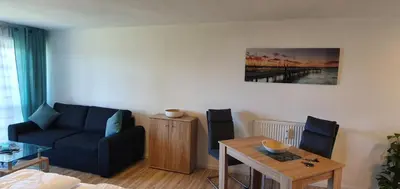Ein Sitzbereich in der Unterkunft Ferienwohnung März