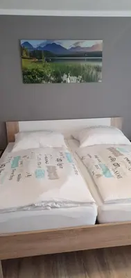 Ein Bett oder Betten in einem Zimmer der Unterkunft Ferienwohnung März