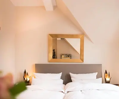 Ein Bett oder Betten in einem Zimmer der Unterkunft Hotel Ritzi