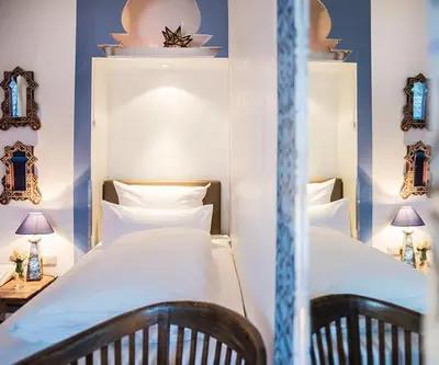 Ein Bett oder Betten in einem Zimmer der Unterkunft Hotel Ritzi