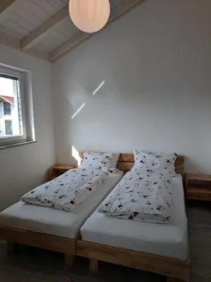 Ein Bett oder Betten in einem Zimmer der Unterkunft Haus Märzenbach