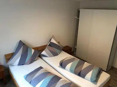 Ein Bett oder Betten in einem Zimmer der Unterkunft Haus Märzenbach