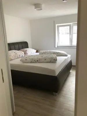 Ein Bett oder Betten in einem Zimmer der Unterkunft Haus Märzenbach