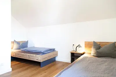 Ein Bett oder Betten in einem Zimmer der Unterkunft Stadl-Appartements