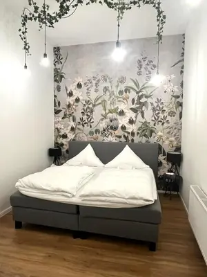 Ein Bett oder Betten in einem Zimmer der Unterkunft Loft directly next to Oktoberfest and downtown