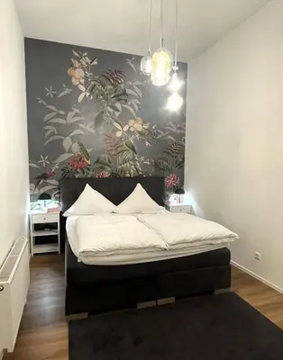 Ein Bett oder Betten in einem Zimmer der Unterkunft Loft directly next to Oktoberfest and downtown