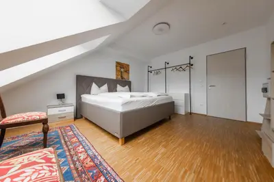 Ein Bett oder Betten in einem Zimmer der Unterkunft Hotel Freischütz Apartments