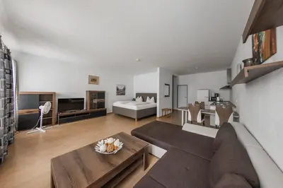 Ein Sitzbereich in der Unterkunft Hotel Freischütz Apartments