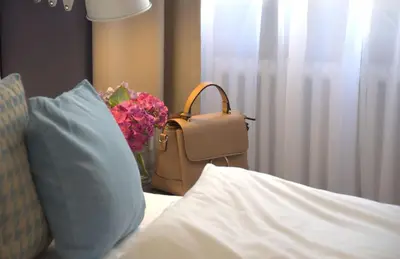 Ein Bett oder Betten in einem Zimmer der Unterkunft Lizz Hotel Munich