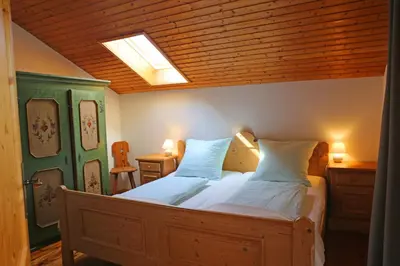 Ein Bett oder Betten in einem Zimmer der Unterkunft Ferienwohnungen Mittermayer