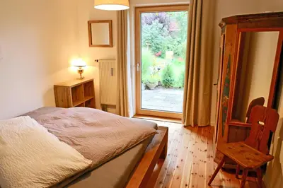 Ein Bett oder Betten in einem Zimmer der Unterkunft Ferienwohnungen Mittermayer