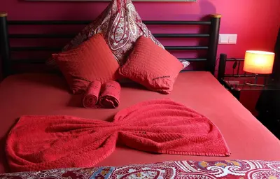 Ein Bett oder Betten in einem Zimmer der Unterkunft Lustra Stundenhotel - Adults Only
