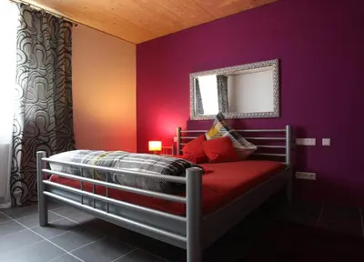 Ein Bett oder Betten in einem Zimmer der Unterkunft Lustra Stundenhotel - Adults Only