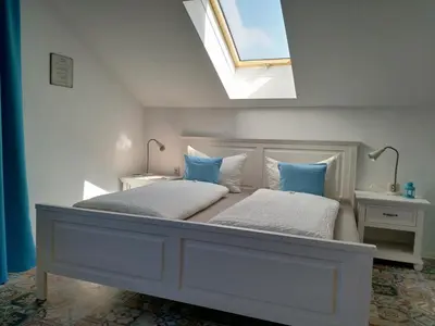 Ein Bett oder Betten in einem Zimmer der Unterkunft Appartements Apfelblüte