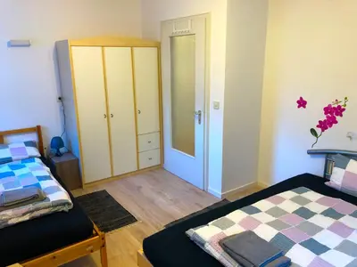 Ein Bett oder Betten in einem Zimmer der Unterkunft Ferienwohnung Fischach