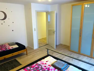 Ein Bett oder Betten in einem Zimmer der Unterkunft Ferienwohnung Fischach