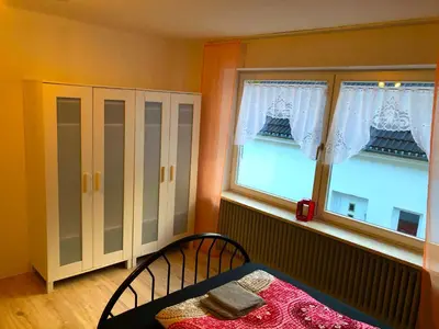 Ein Bett oder Betten in einem Zimmer der Unterkunft Ferienwohnung Fischach