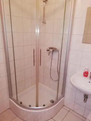 Ein Badezimmer in der Unterkunft Pension Feldschlössl