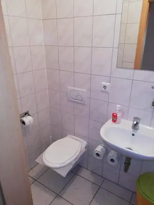 Ein Badezimmer in der Unterkunft Pension Feldschlössl