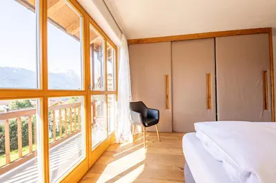 Ein Bett oder Betten in einem Zimmer der Unterkunft Ferienhaus „Adlerhorst“ eignet sich ideal für die ganze Familie
