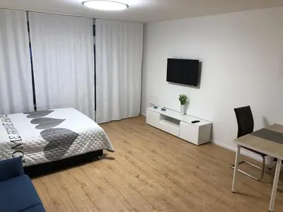Ein Bett oder Betten in einem Zimmer der Unterkunft Apartment Augsburg Mitte