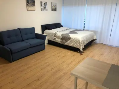 Ein Bett oder Betten in einem Zimmer der Unterkunft Apartment Augsburg Mitte