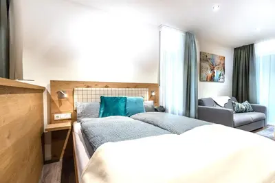 Ein Bett oder Betten in einem Zimmer der Unterkunft REINERS Quartier - relaxed living