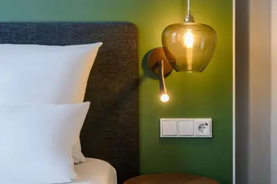 Ein Bett oder Betten in einem Zimmer der Unterkunft Flightgate Munich Airport Hotel, a member of Radisson Individuals
