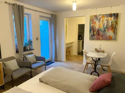 Ein Sitzbereich in der Unterkunft Helle Souterrainwohnung mit Komfort