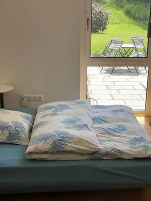 Ein Bett oder Betten in einem Zimmer der Unterkunft Villa Starnberger See