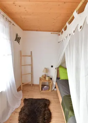 Ein Bett oder Betten in einem Zimmer der Unterkunft Ferienwohnungen Eisler