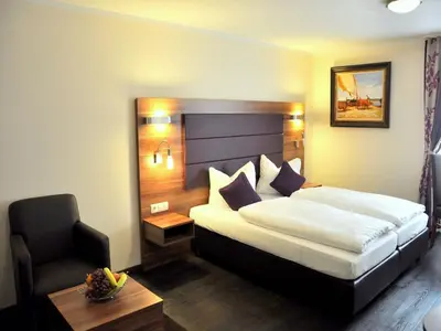 Ein Bett oder Betten in einem Zimmer der Unterkunft BATU Apart Hotel