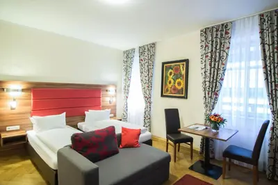 Ein Bett oder Betten in einem Zimmer der Unterkunft BATU Apart Hotel