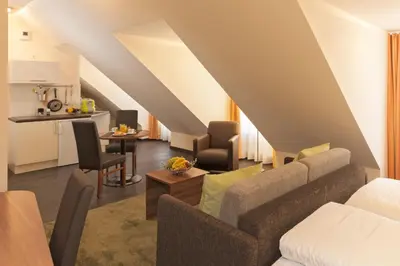 Ein Sitzbereich in der Unterkunft BATU Apart Hotel