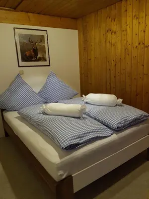 Ein Bett oder Betten in einem Zimmer der Unterkunft Ferienwohnung Kraihof, 83703 Gmund am Tegernsee