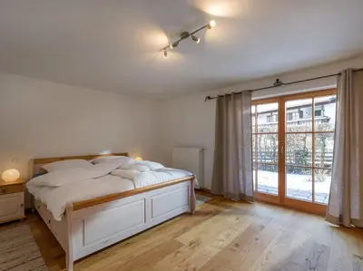 Ein Bett oder Betten in einem Zimmer der Unterkunft Ferienwohnung Bergahorn
