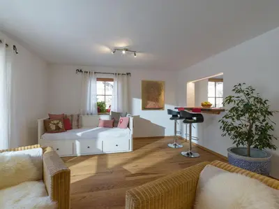Ein Sitzbereich in der Unterkunft Ferienwohnung Bergahorn