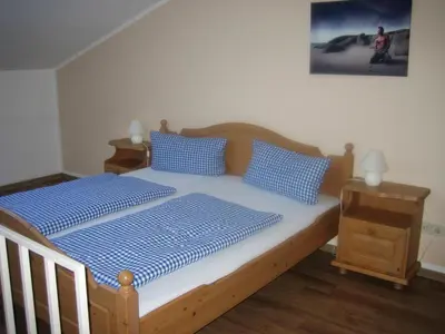 Ein Bett oder Betten in einem Zimmer der Unterkunft Bergschlössl Whg 23