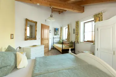 Ein Bett oder Betten in einem Zimmer der Unterkunft Ferienwohnungen Penners