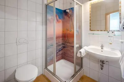 Ein Badezimmer in der Unterkunft Mikro Apartments Erding