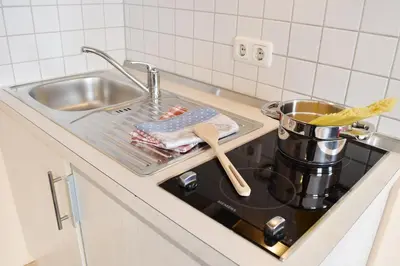 Küche/Küchenzeile in der Unterkunft Mikro Apartments Erding
