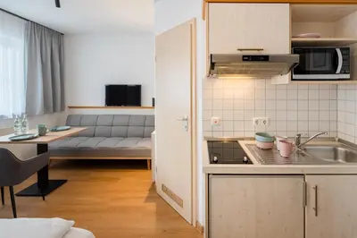 Küche/Küchenzeile in der Unterkunft Mikro Apartments Erding