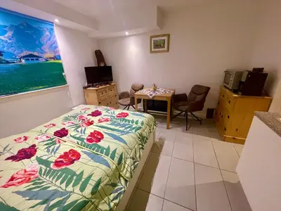 Ein Bett oder Betten in einem Zimmer der Unterkunft Apartment Geigelsteinstrasse