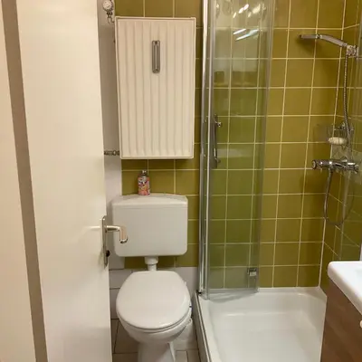 Ein Badezimmer in der Unterkunft Apartment Geigelsteinstrasse