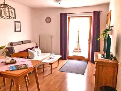 Ein Sitzbereich in der Unterkunft Ferienwohnungen Meyerlhof