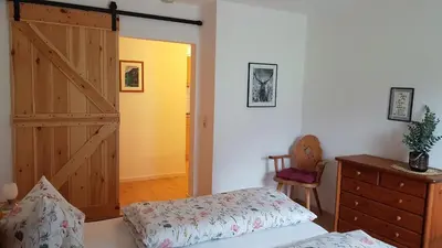 Ein Bett oder Betten in einem Zimmer der Unterkunft Ferienwohnungen Meyerlhof