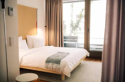 Ein Bett oder Betten in einem Zimmer der Unterkunft ANAGRAM - Haus im Tal