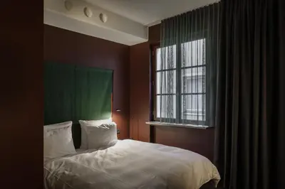 Ein Bett oder Betten in einem Zimmer der Unterkunft ANAGRAM - Haus im Tal